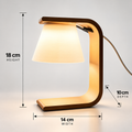 Kiro Aven minimalist table lamp with a white shade, smooth curved frame and brown base, featuring integrated cool-white LED lighting.